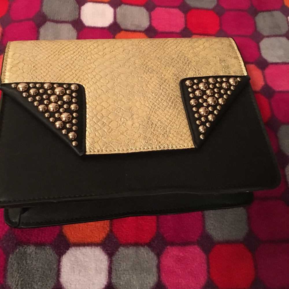 Arden B clutch bag